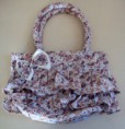 /album/bolsas/bolsa-floral-marrom-jpg/